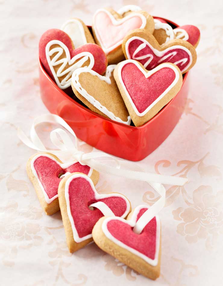 A container of heart biscuits for a wedding