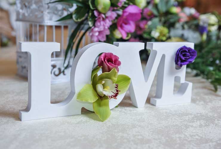 Wedding table letters and flowers