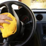 Wiping car steering wheel