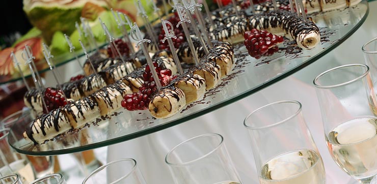 Wedding table centre piece with sweets and berries