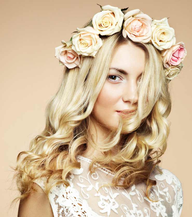 Natural wedding hairstyle with floral headband