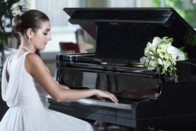 Bride playing piano